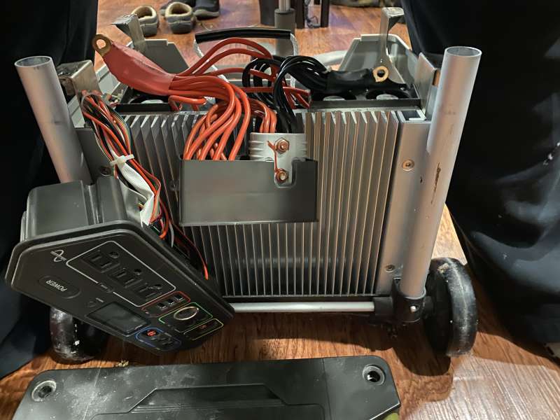 With lid off and control panel dangling 